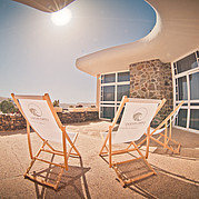 Surf Villa, terrasse avec cheminée